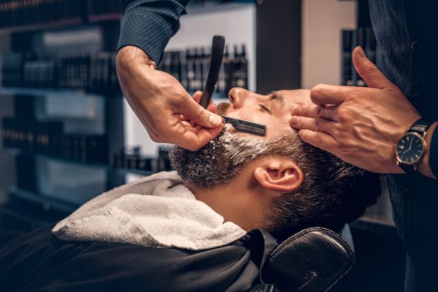 Beard trimming on a professional barber.