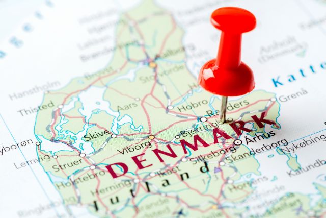 Denmark in the map with a push pin.