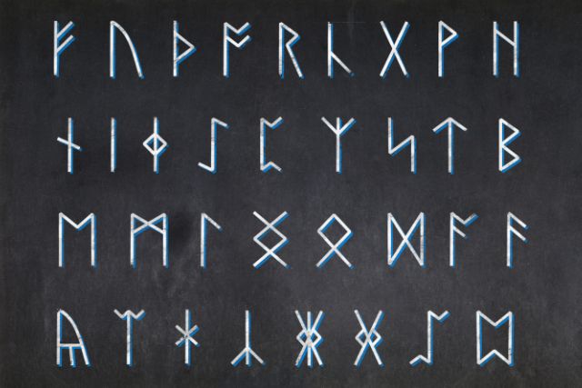 A blackboard with rune alphabets written on it.