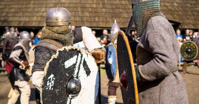 Unidentified participants at medieval fight during of international historical festival of Viking culture.