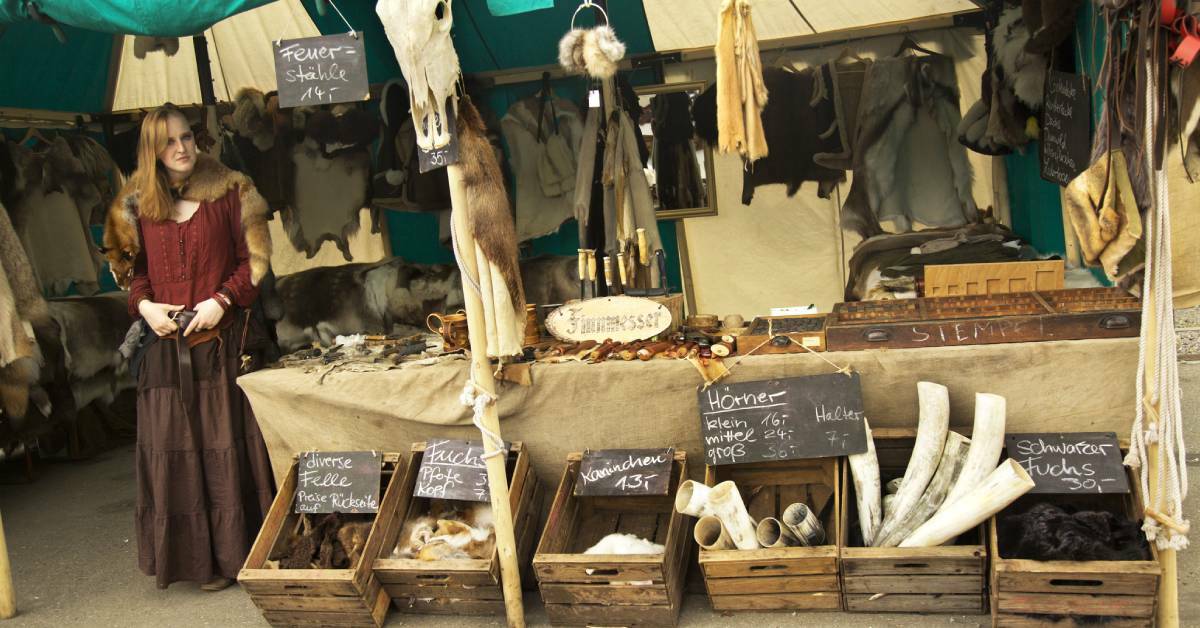 Various viking objects being sold in a market.