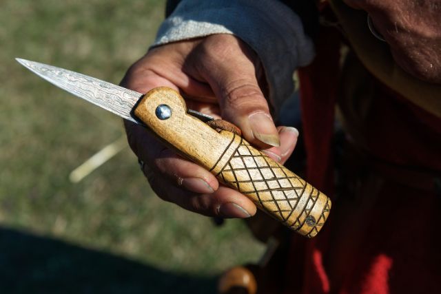 A close up photo of a viking knife replica.