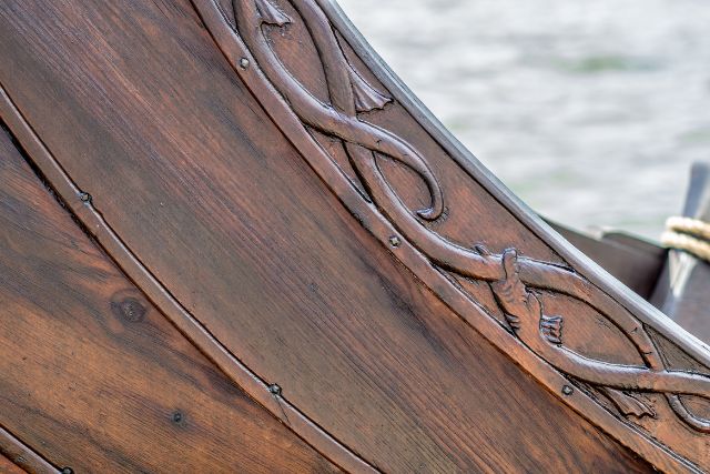 Intricate carvings in a viking ship.